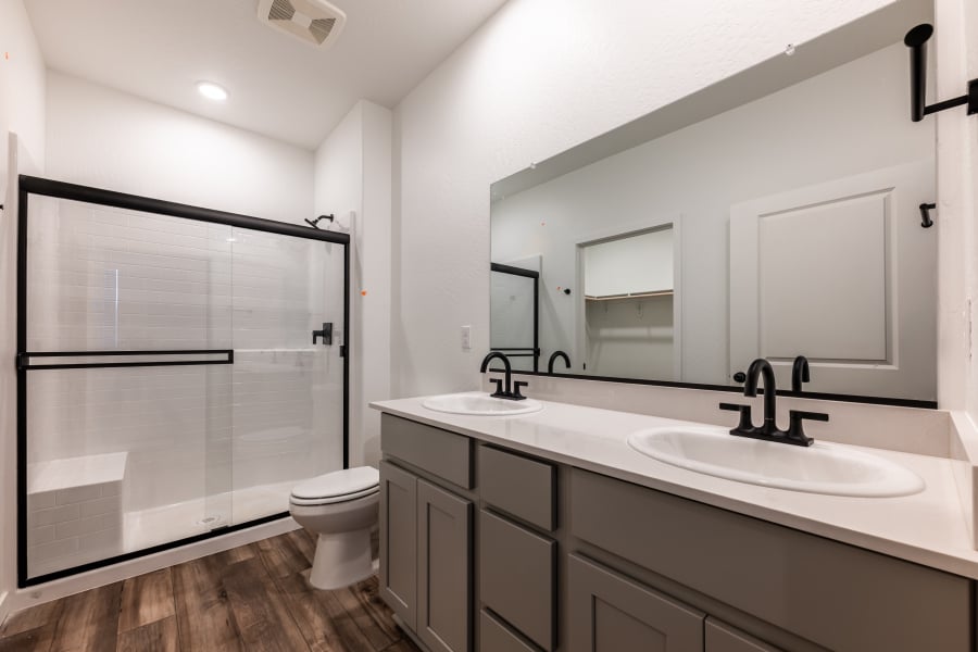 A bathroom with a sink and a toilet.