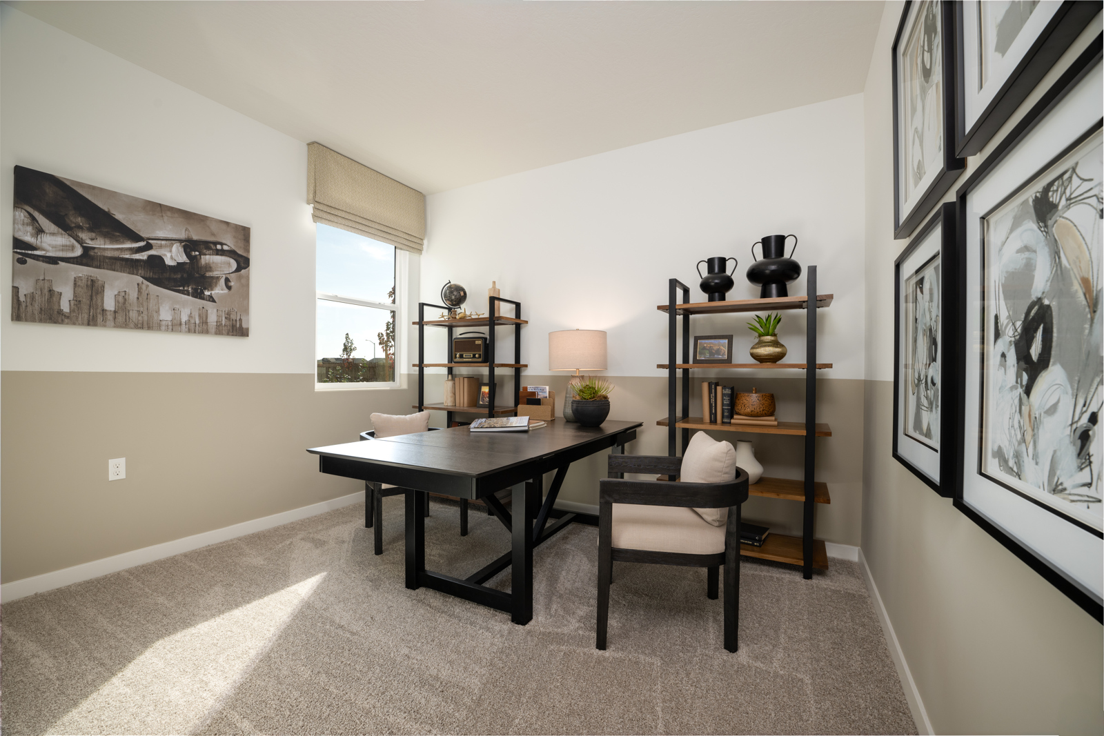 A room with a desk and a chair.