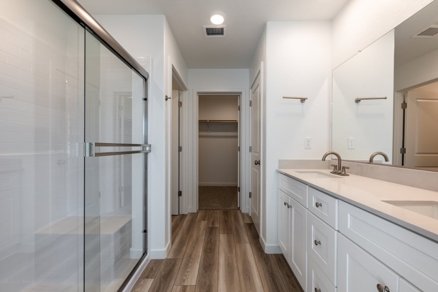 A bathroom with a glass shower.