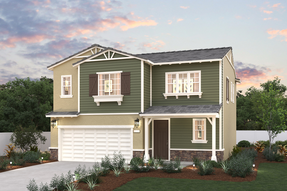 A house with a large front yard.
