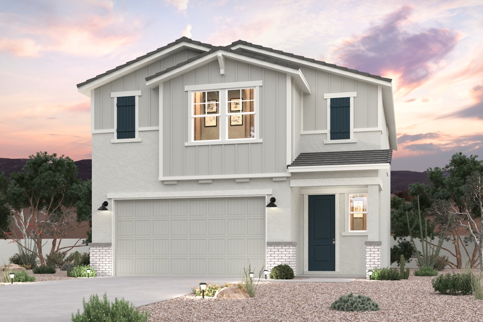 A white house with a garage.