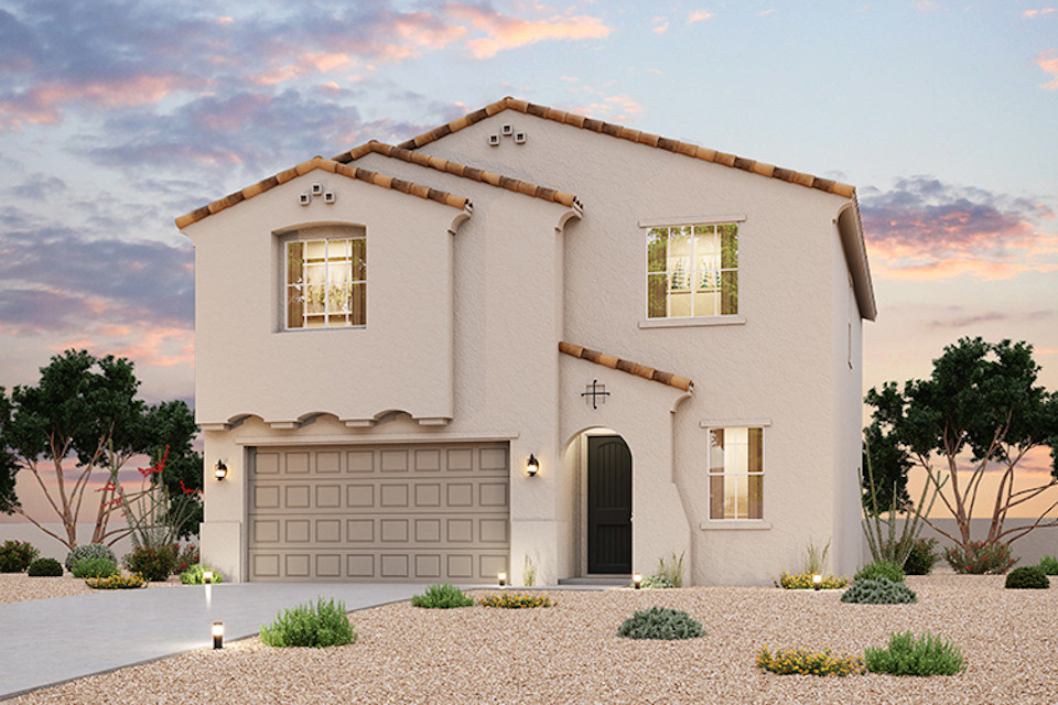 A white house with a garage.