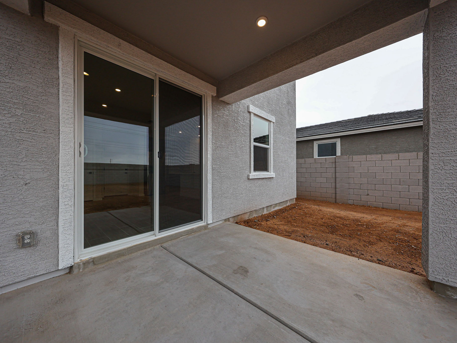 A room with a glass door.