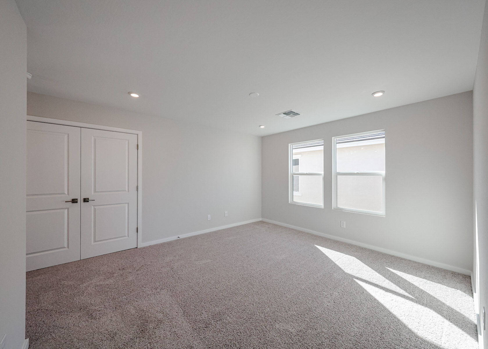 A room with white doors.