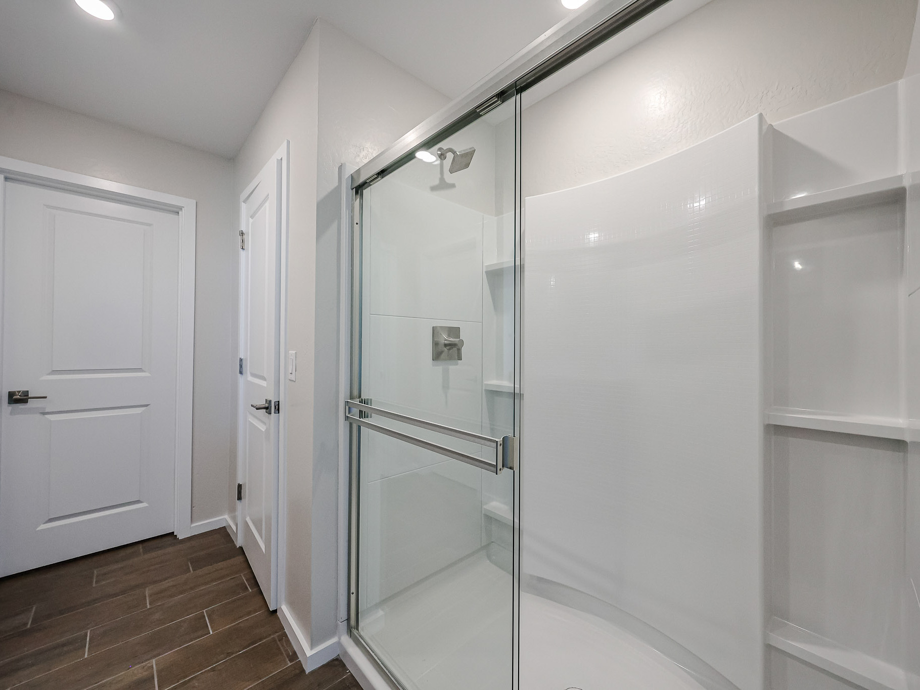 A shower unit in a bathroom.