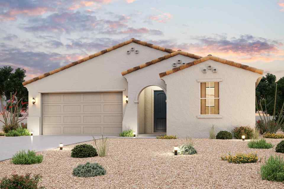 A house with a garage and a driveway.