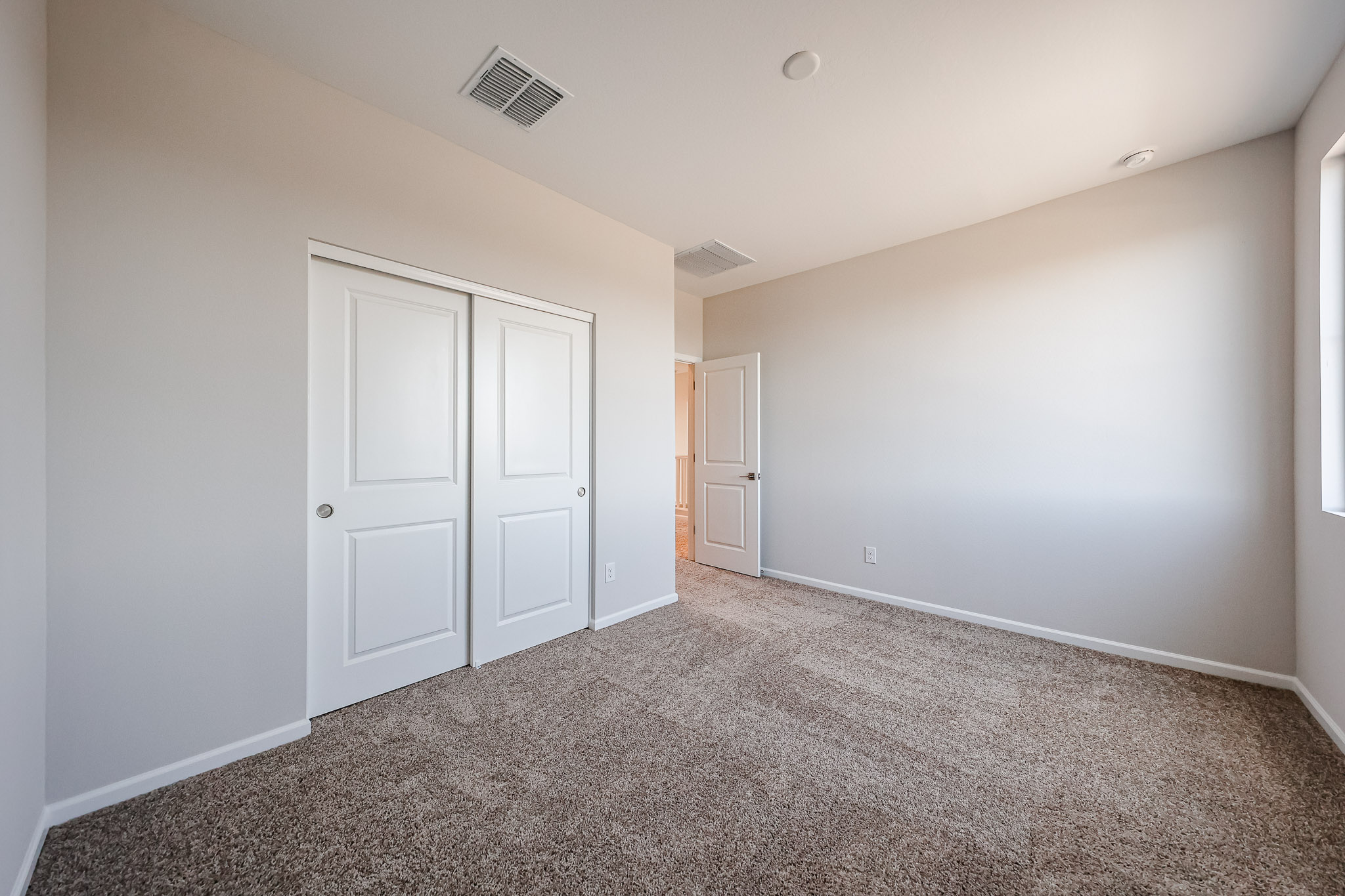 A room with white doors.