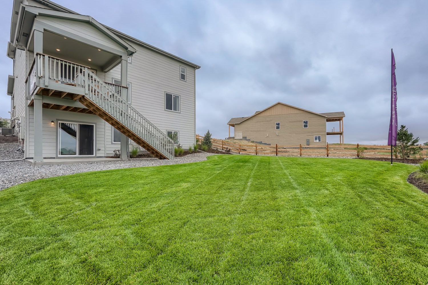 A house with a grass yard.