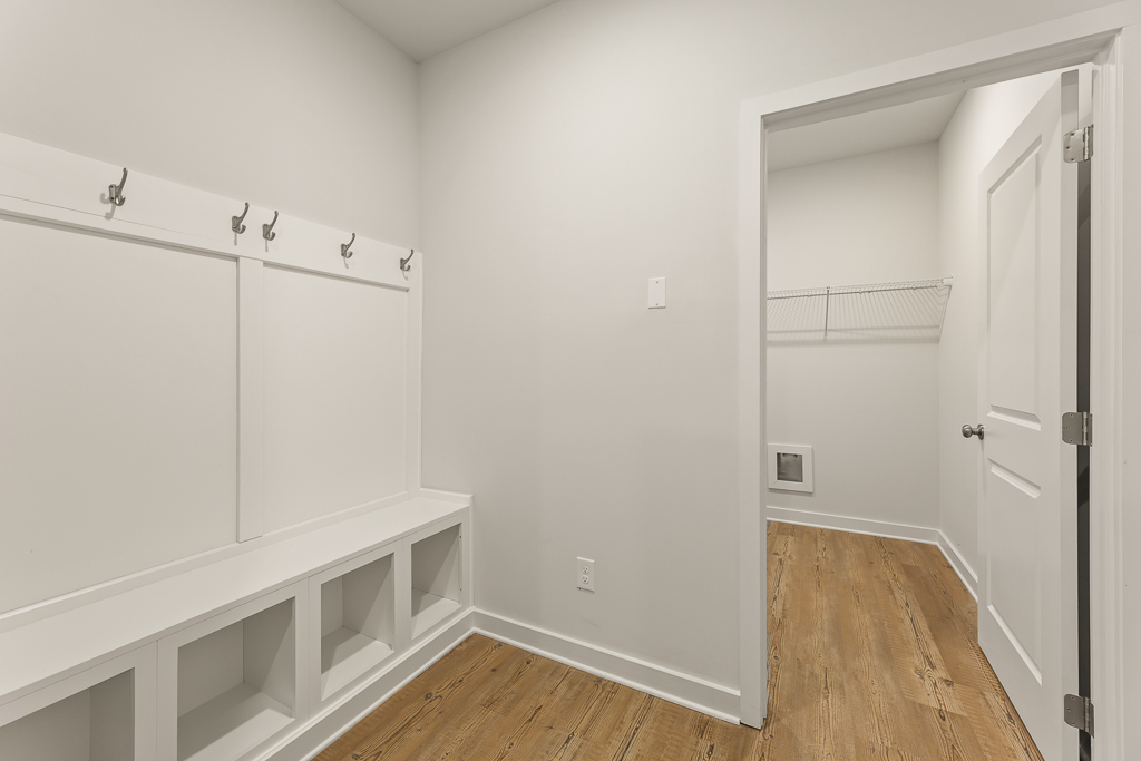 A room with white cabinets.