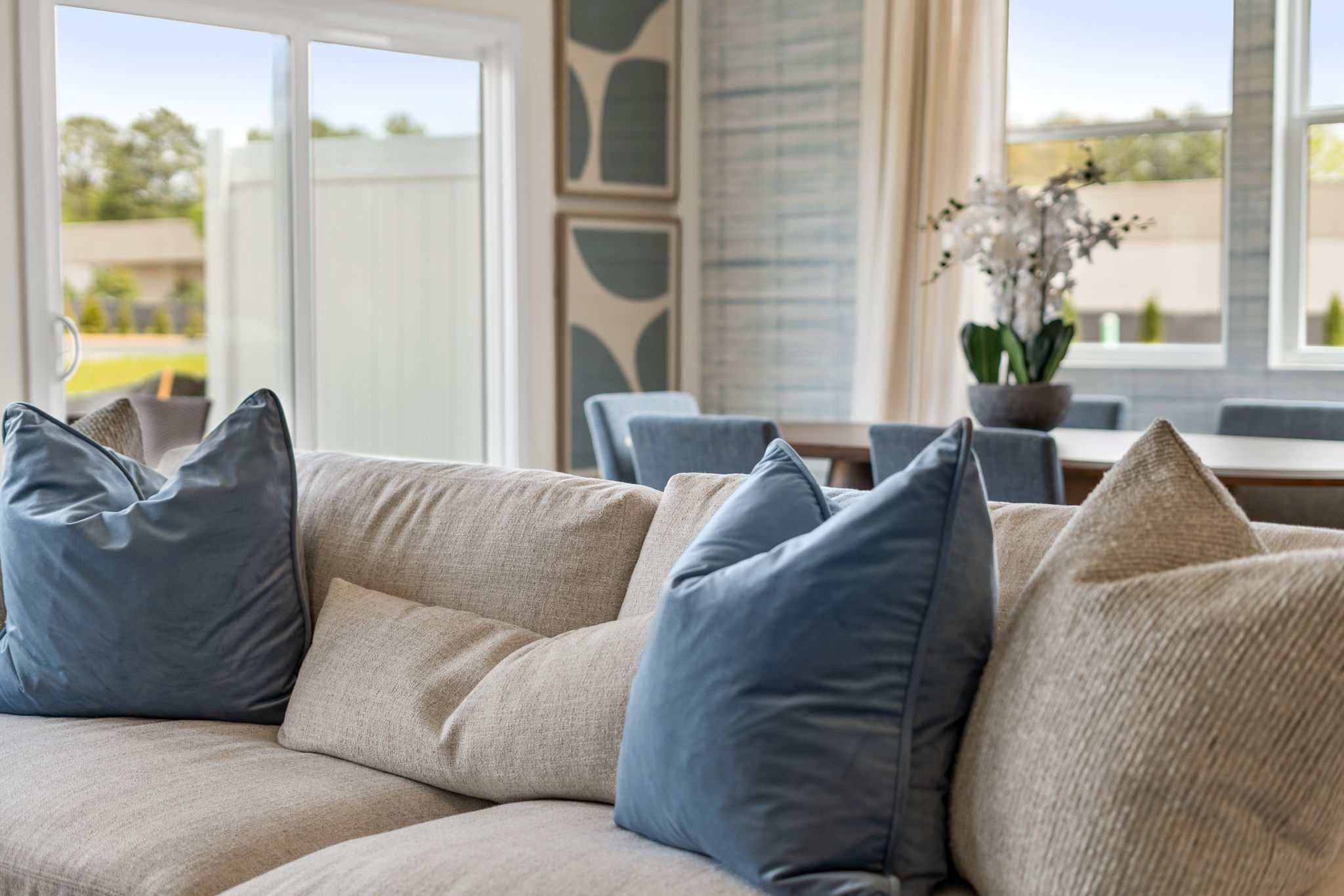 A couch with pillows.