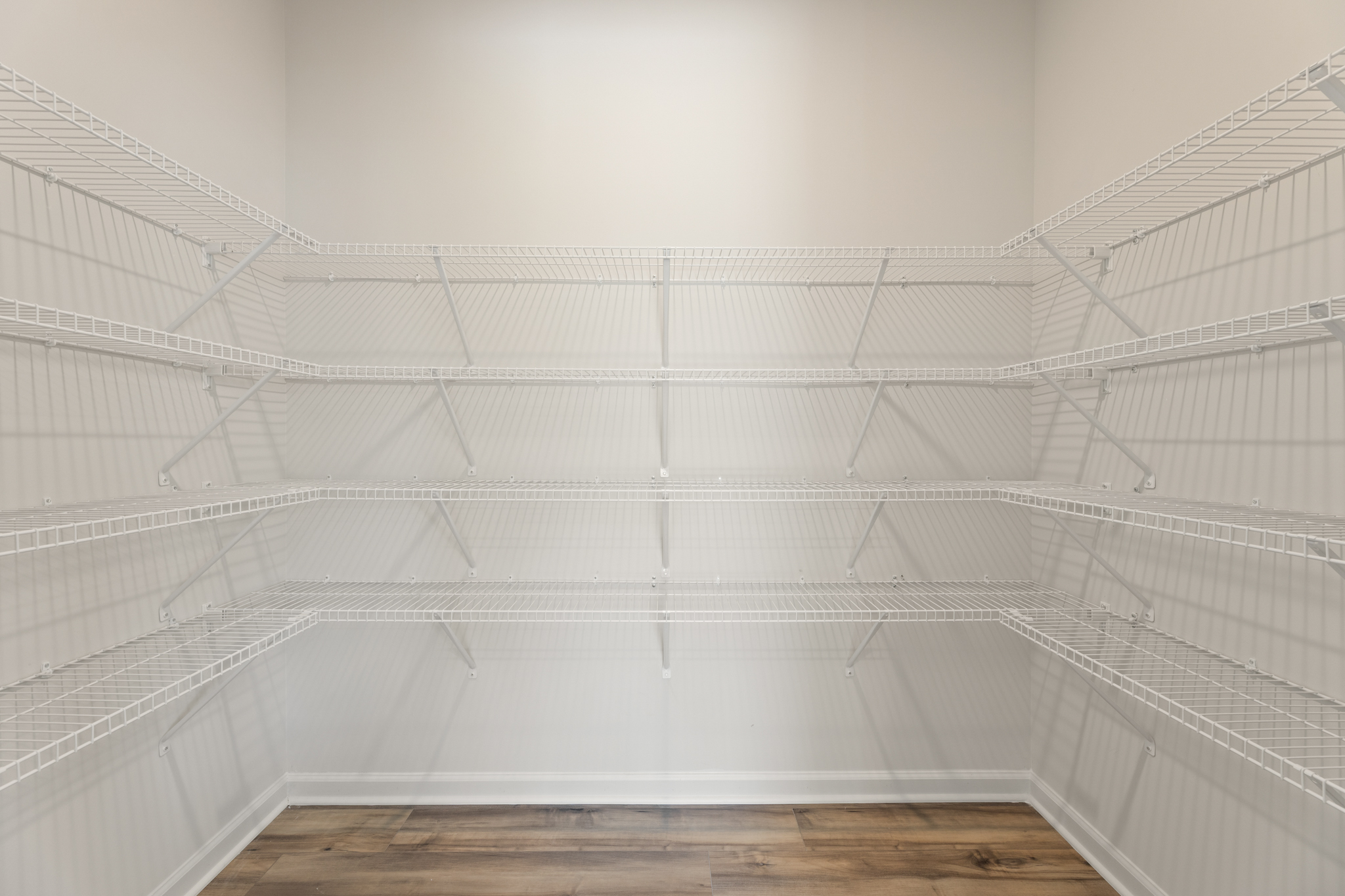 A white staircase with white railings.