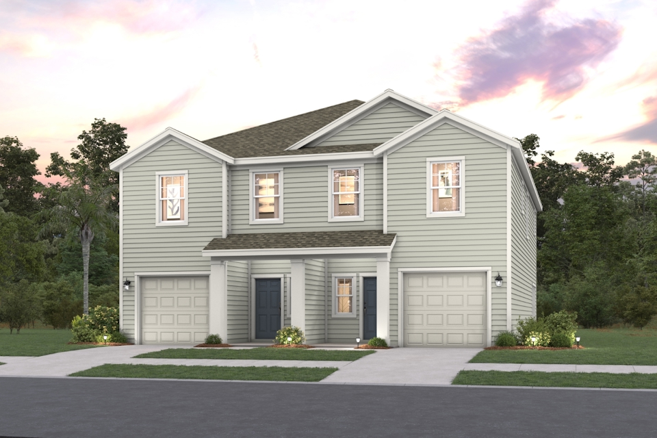 A house with garages and trees.