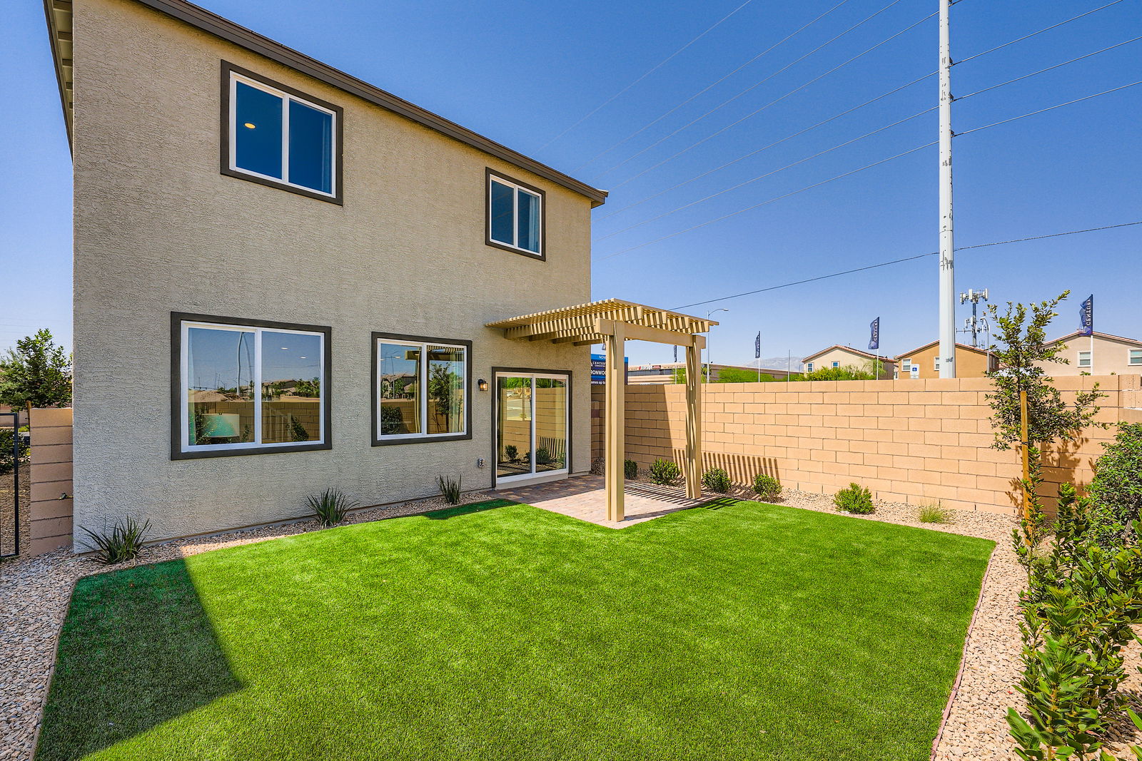A house with a grass yard.