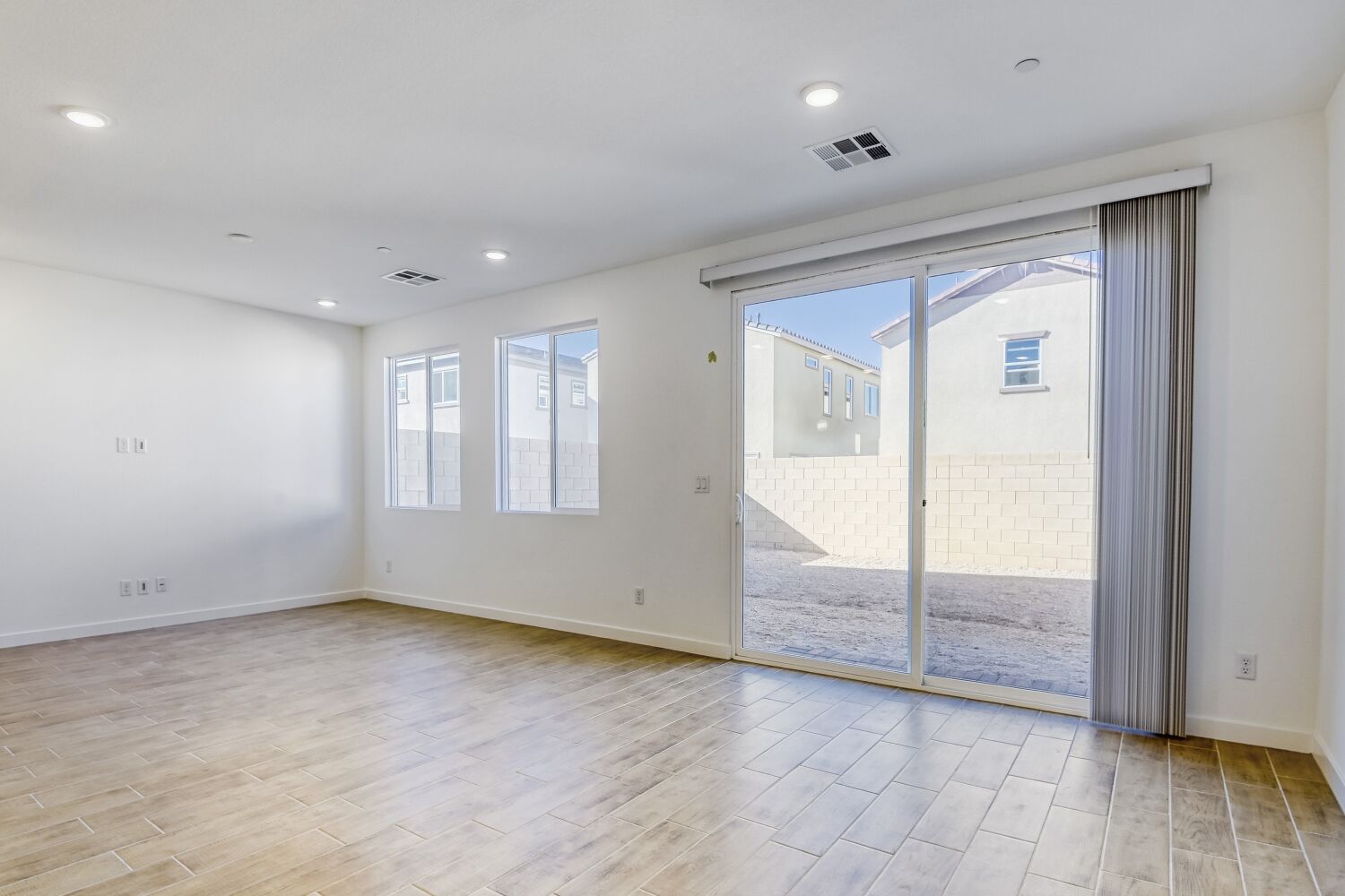 A room with a glass door.