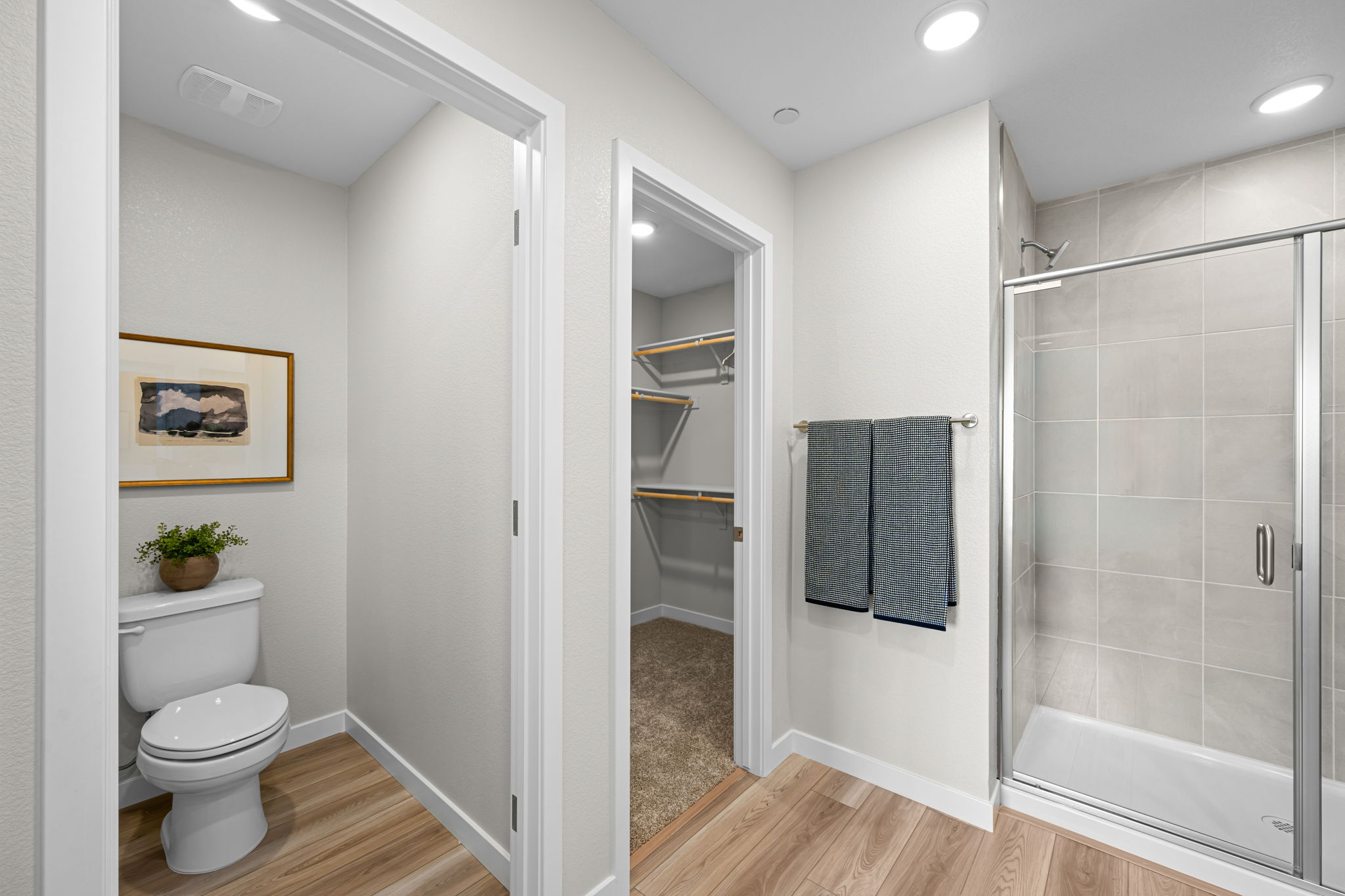 A bathroom with a glass shower.