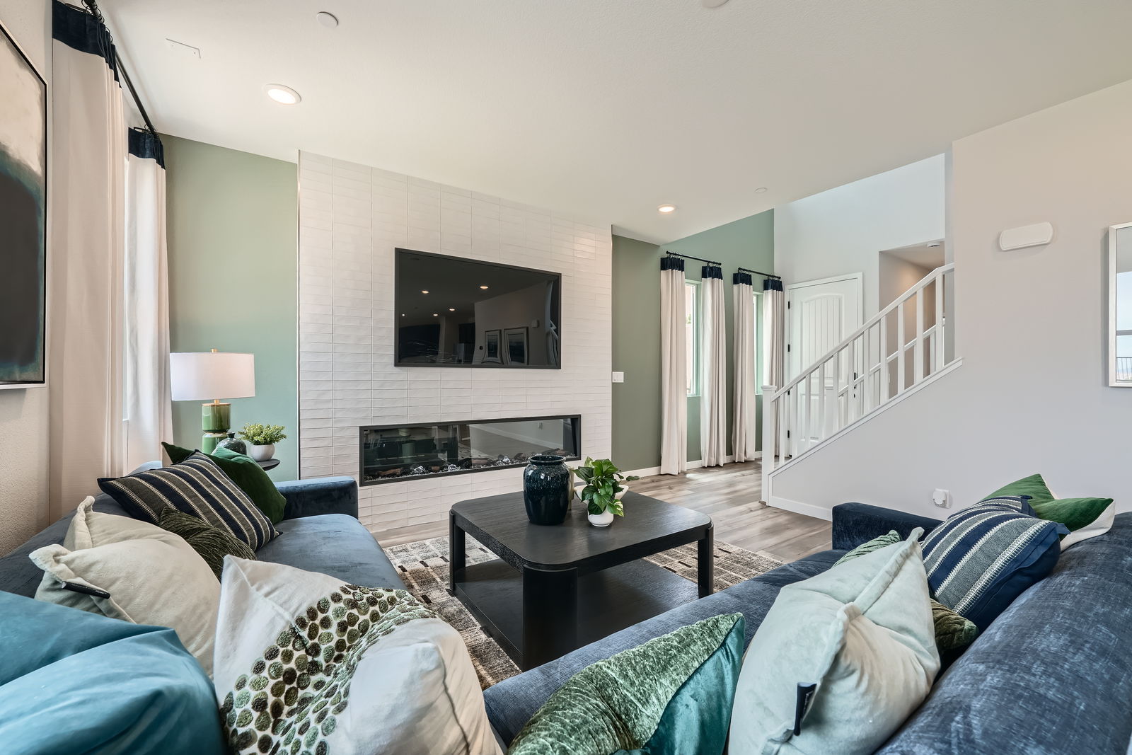 A living room with a fireplace.