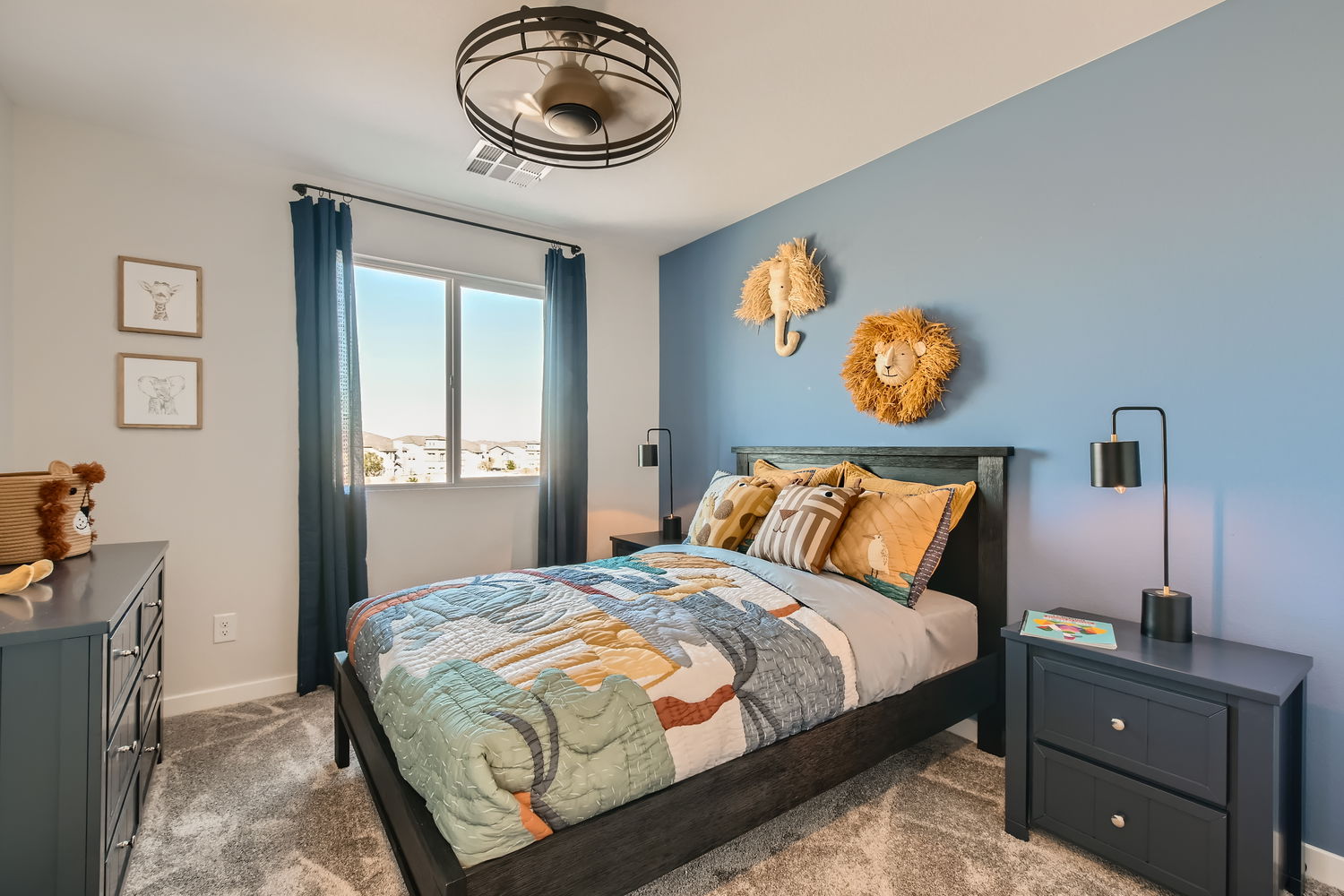 A bedroom with a bed and a window.