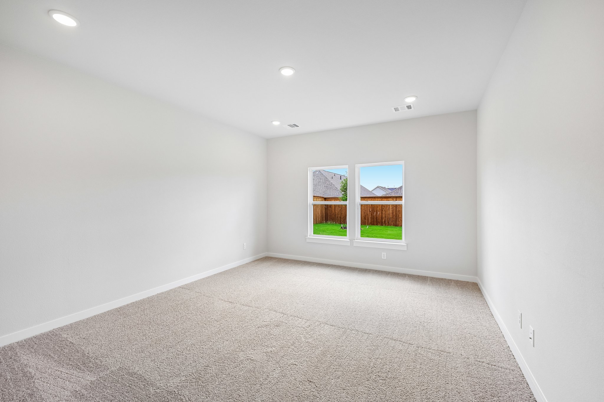 A room with a large window.