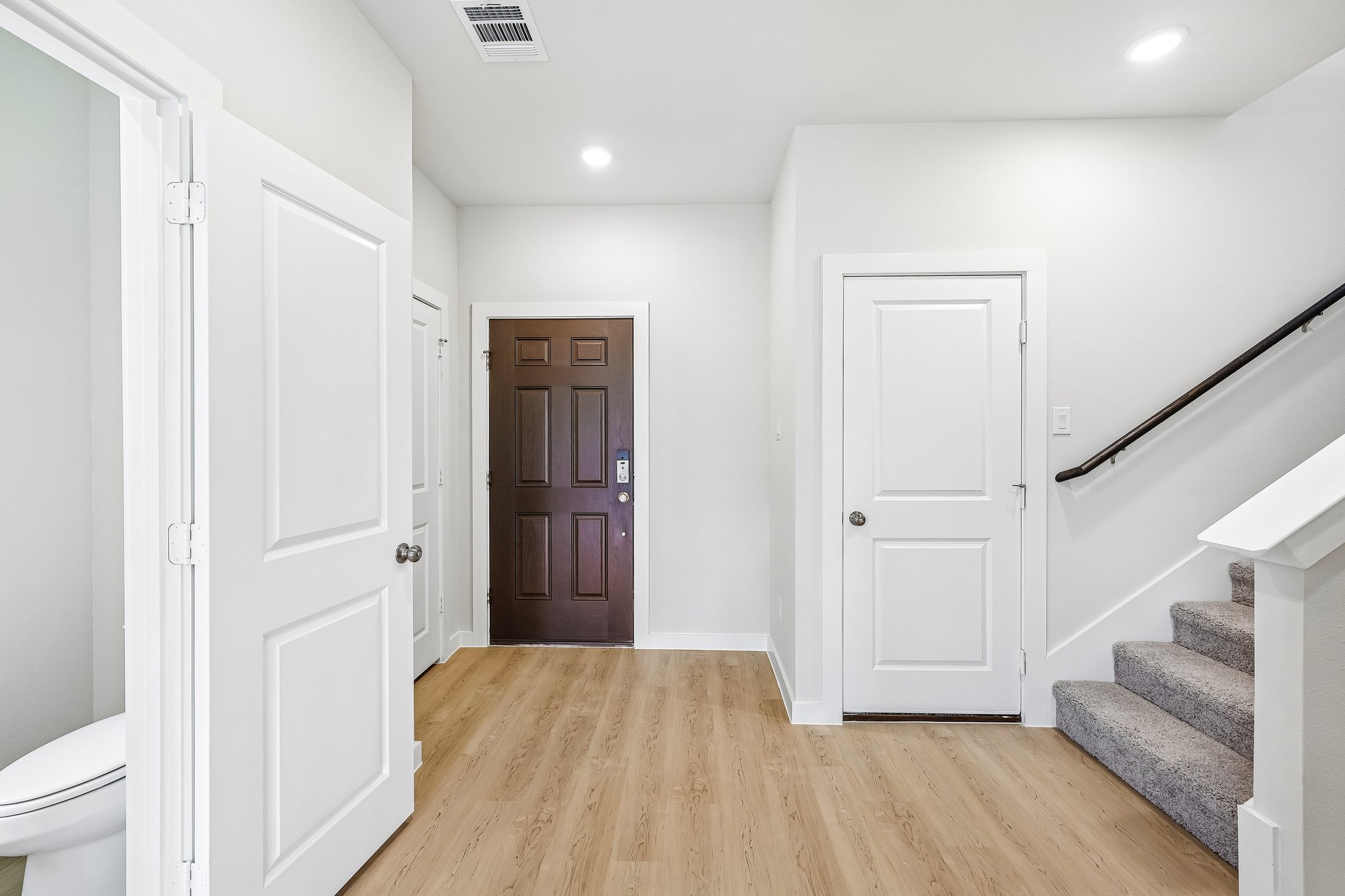 A room with white doors.