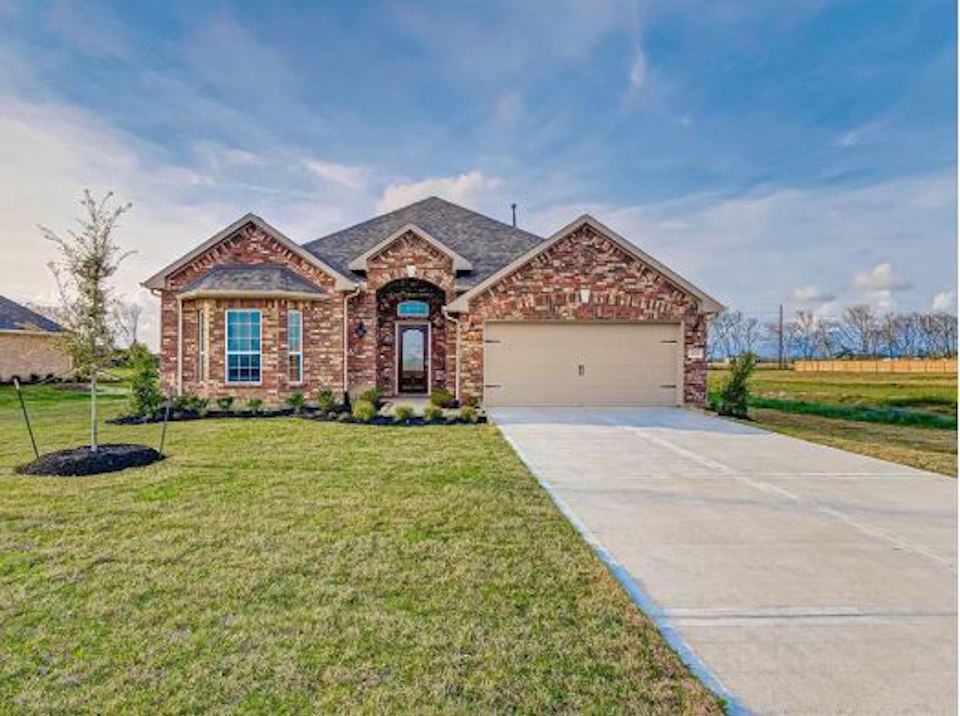 A house with a driveway.