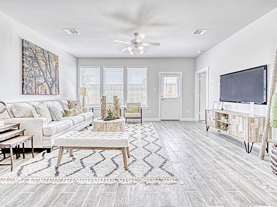 A living room with a tv and couches.