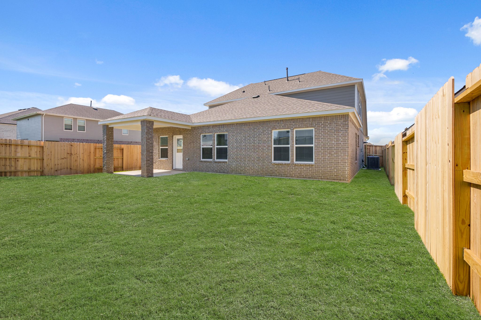 A house with a fence around it.