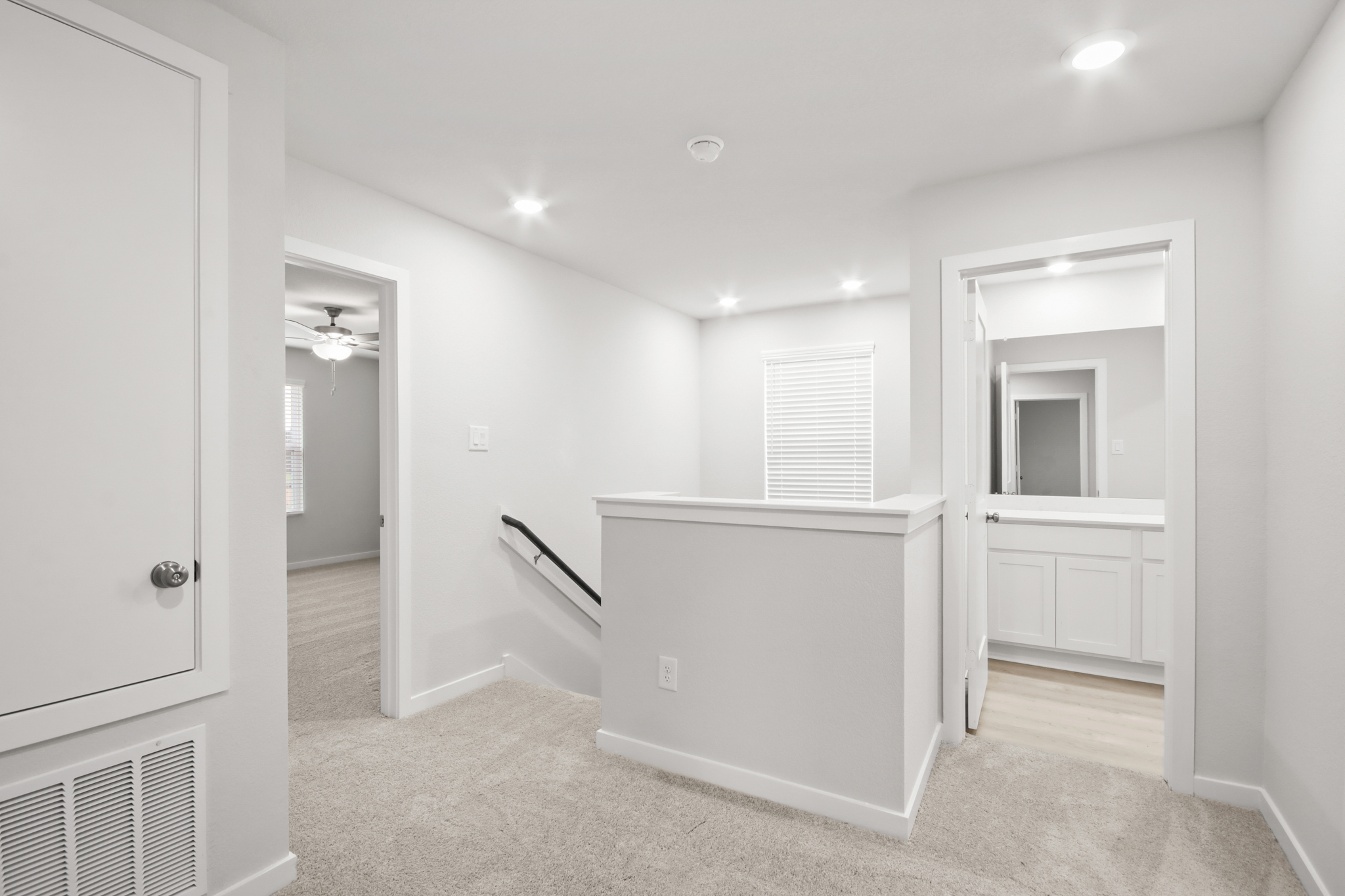 A bathroom with a sink and a mirror.