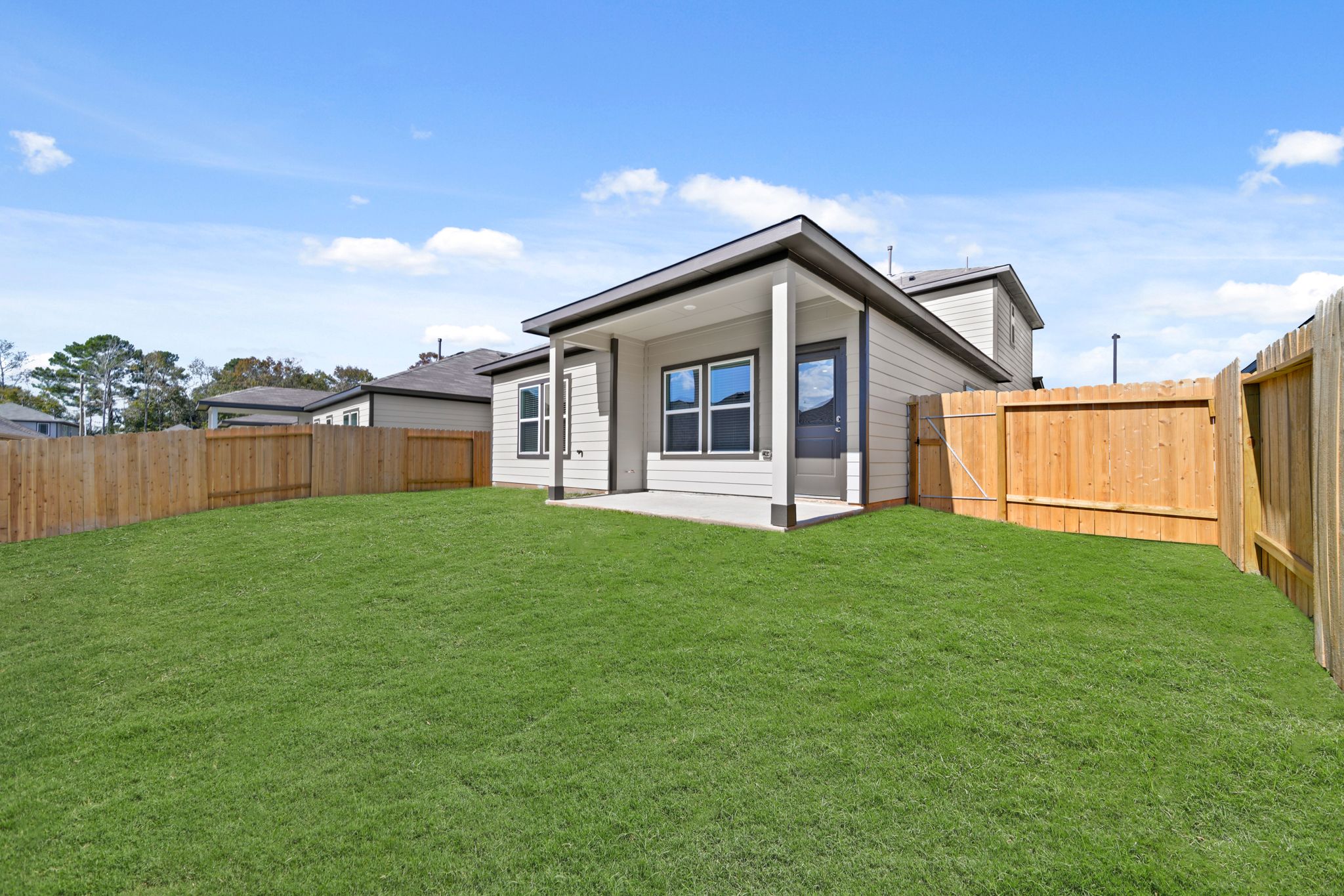 A house with a fence around it.