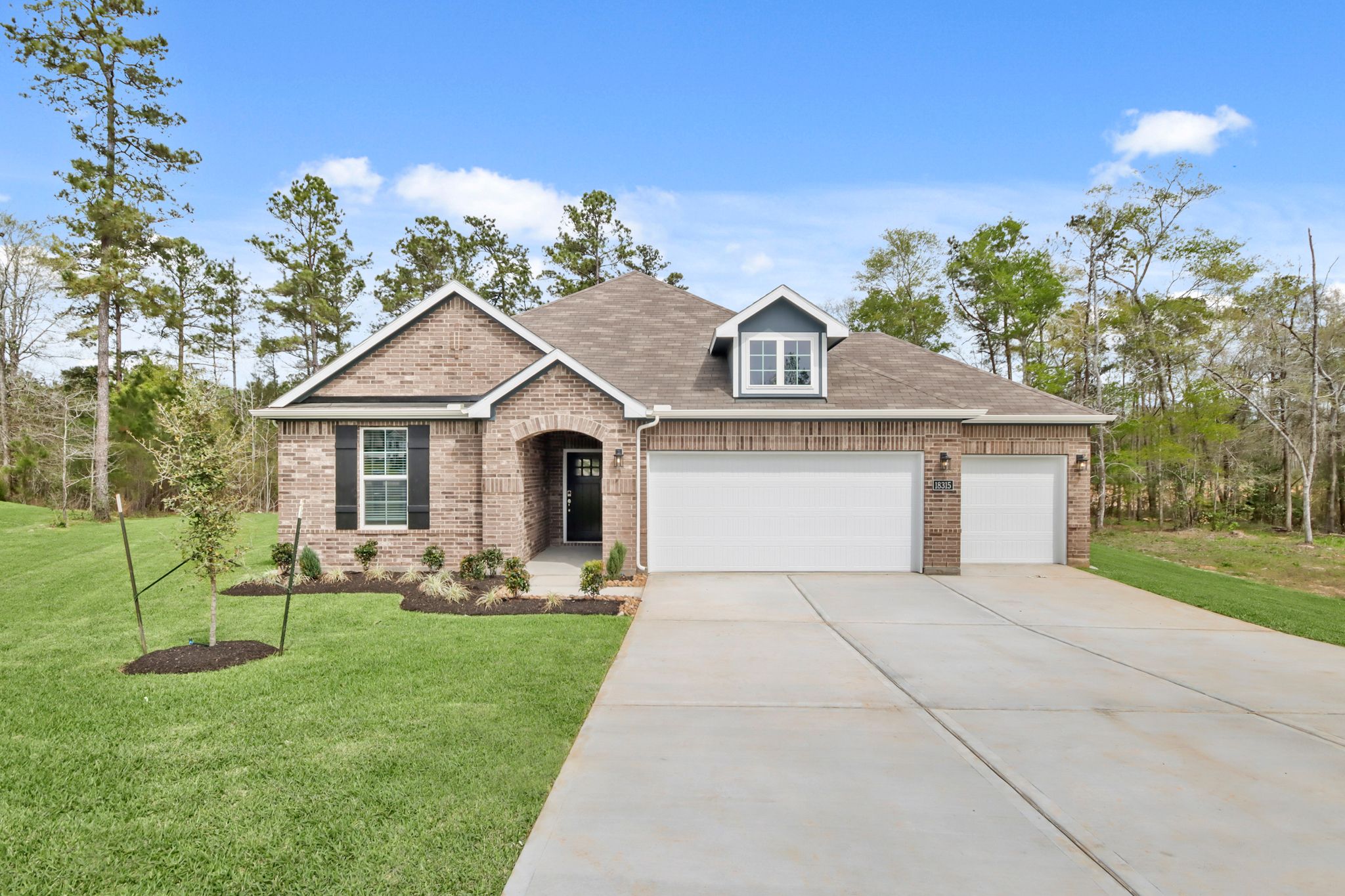 A house with a driveway.
