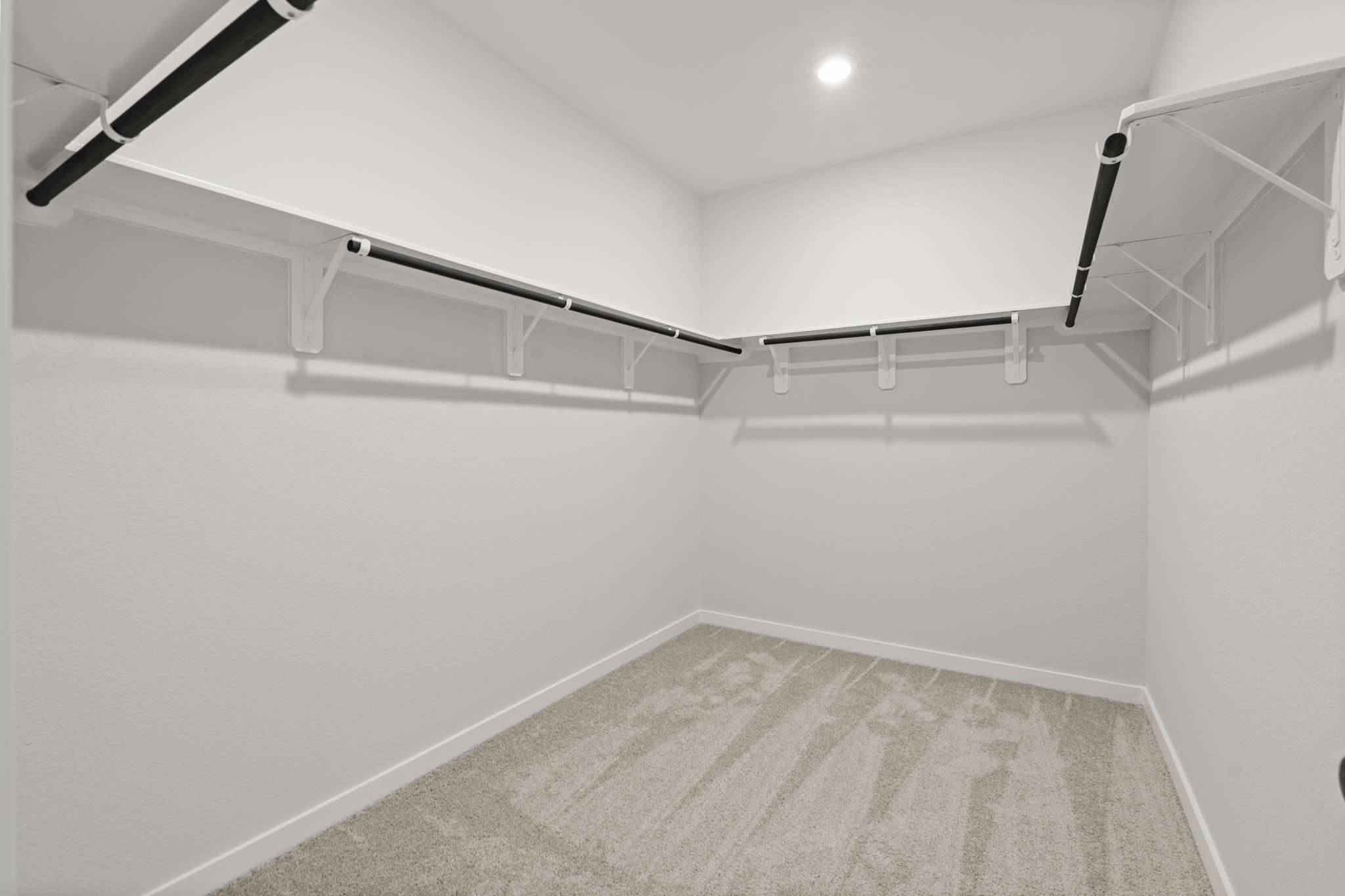 A white staircase with a light.