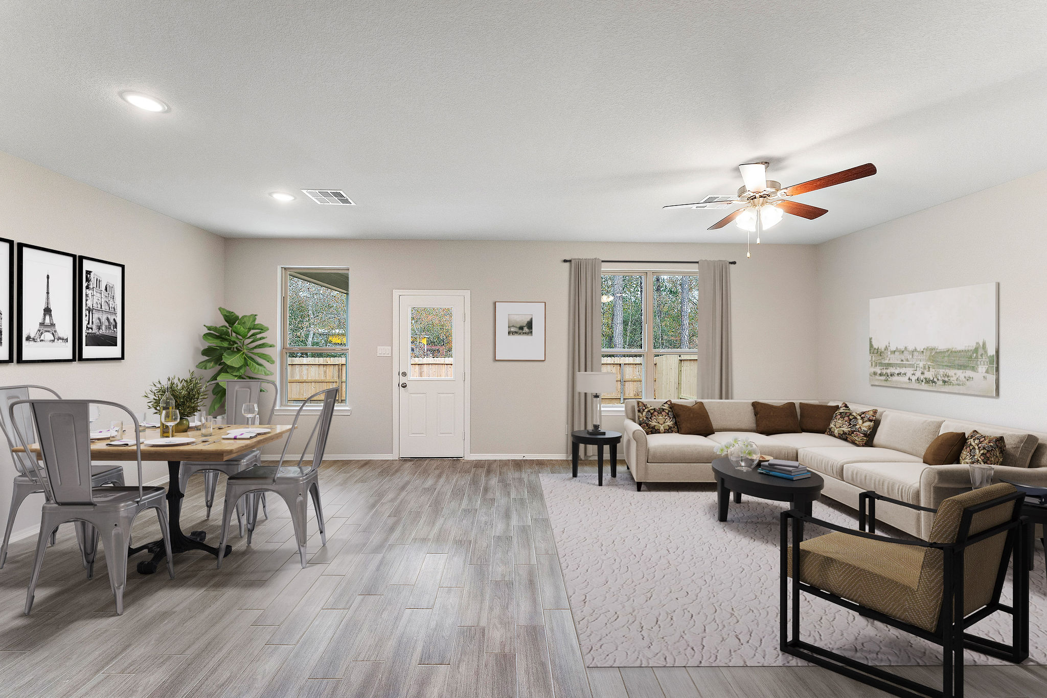 A living room with a chandelier and a couch.