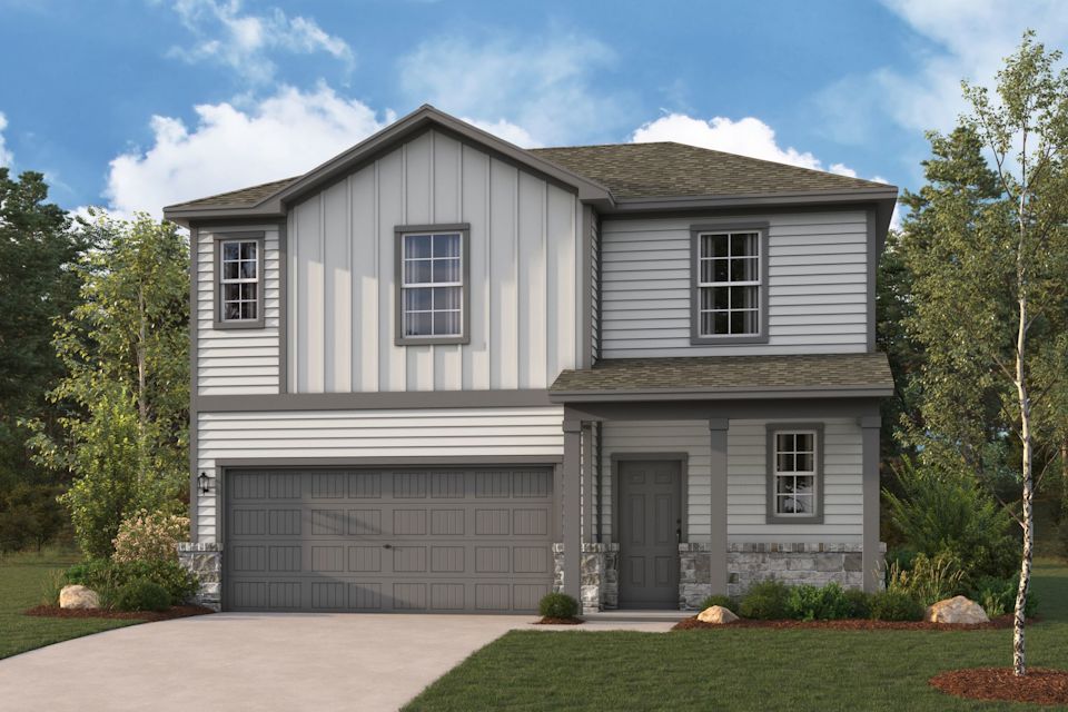 A grey house with a garage.