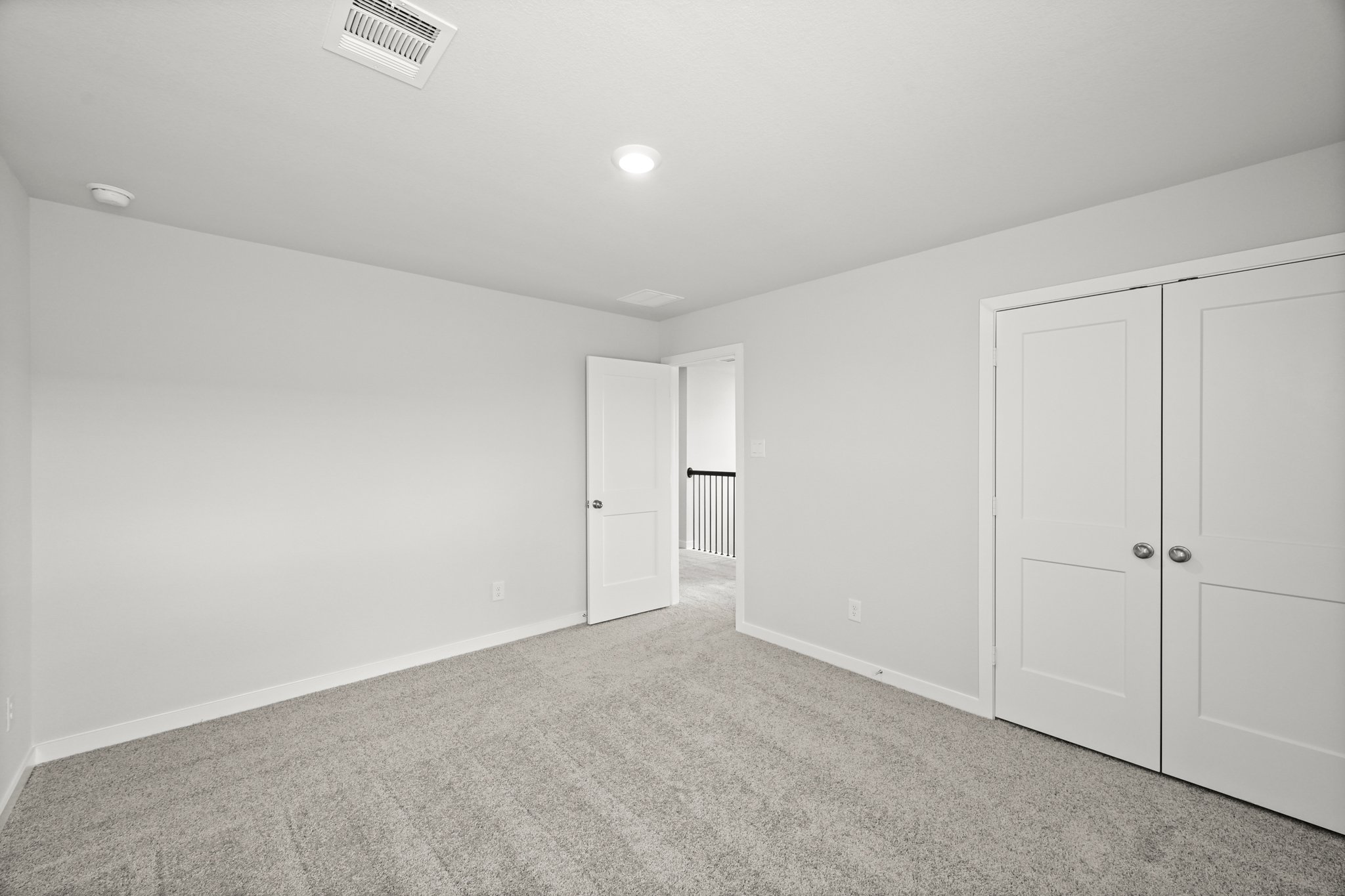 A room with white doors.