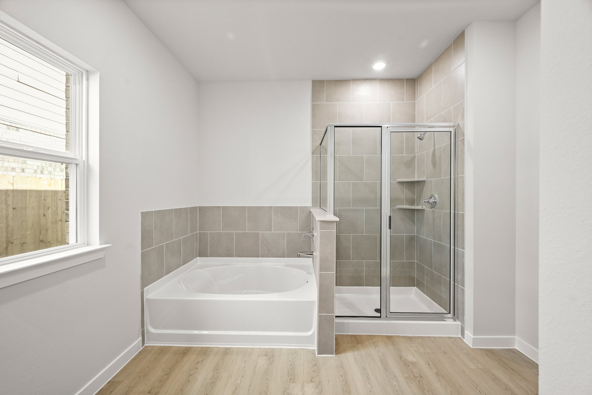 A bathroom with a glass shower.