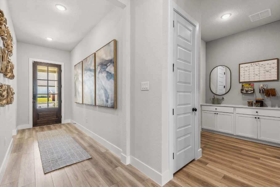 A white room with a rug and a rug.