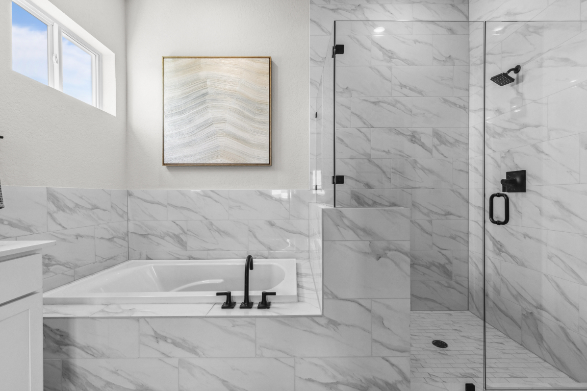 A bathroom with a glass shower.