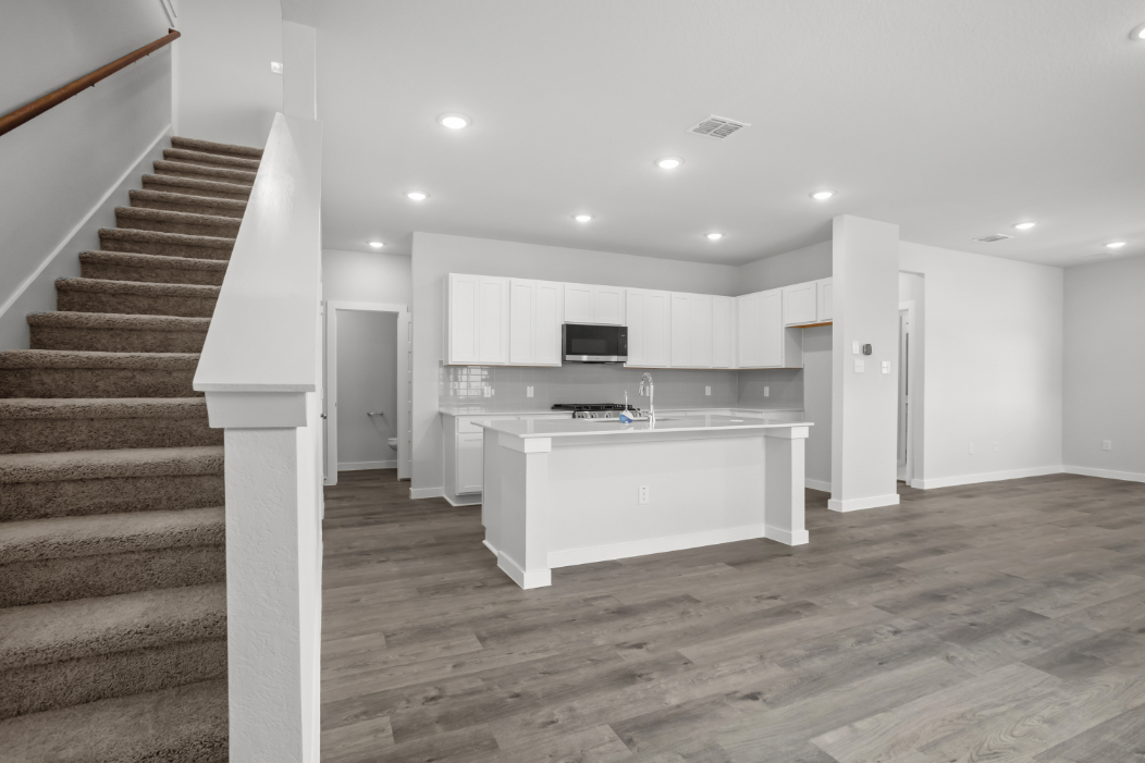 A kitchen and living room.
