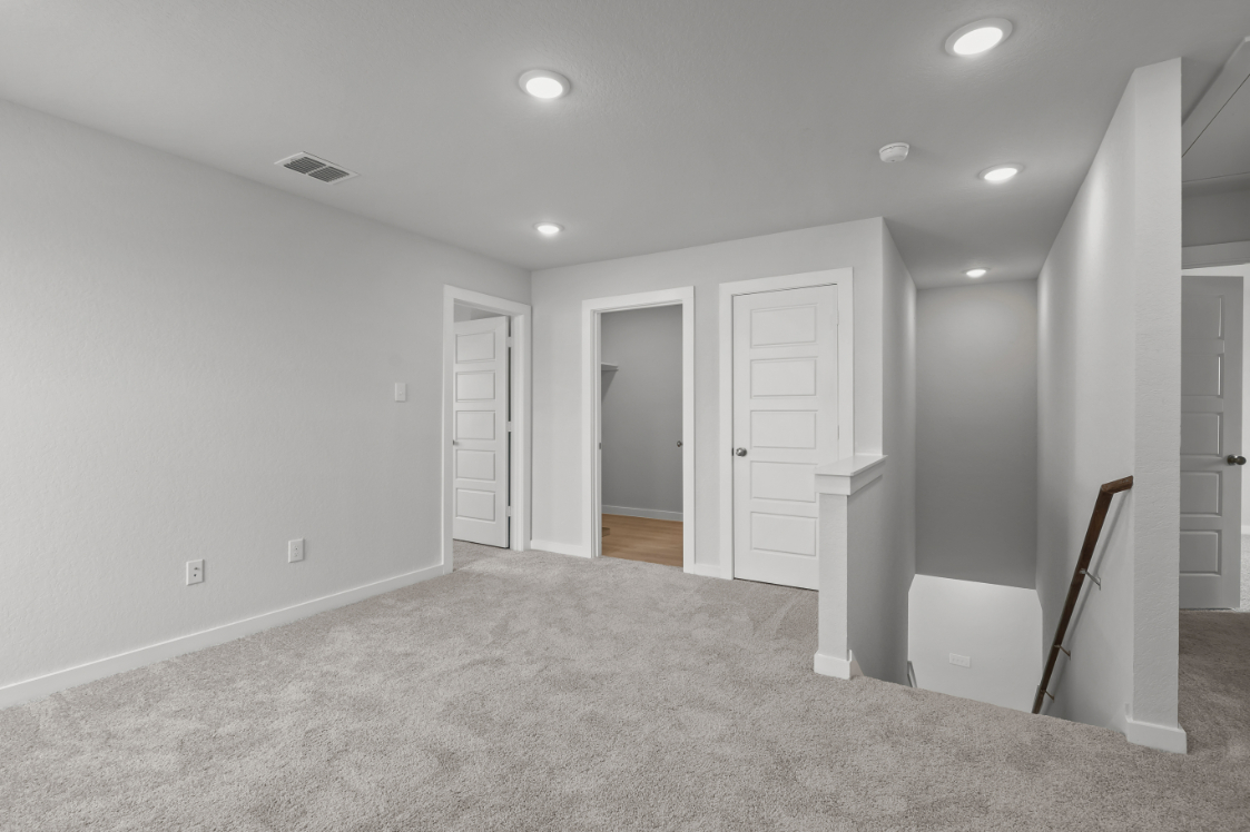 A room with white doors.