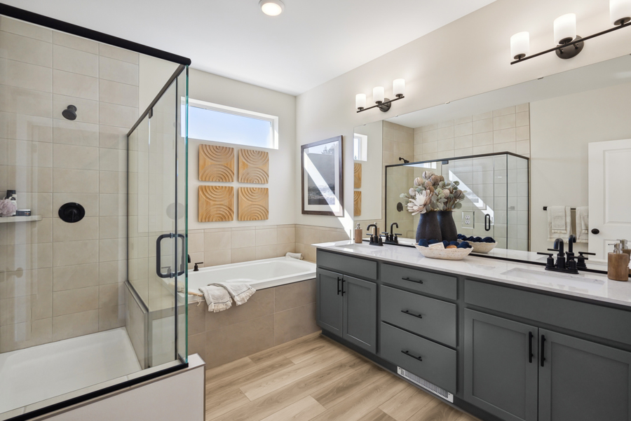 A bathroom with a tub and sink.