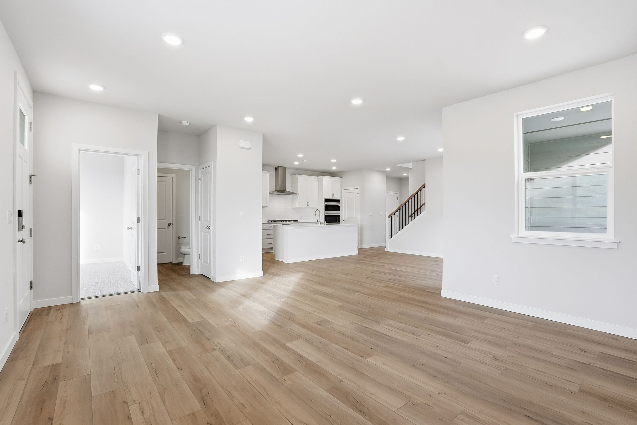 A large empty room with white walls.