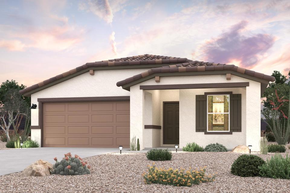 A house with a garage and a driveway.