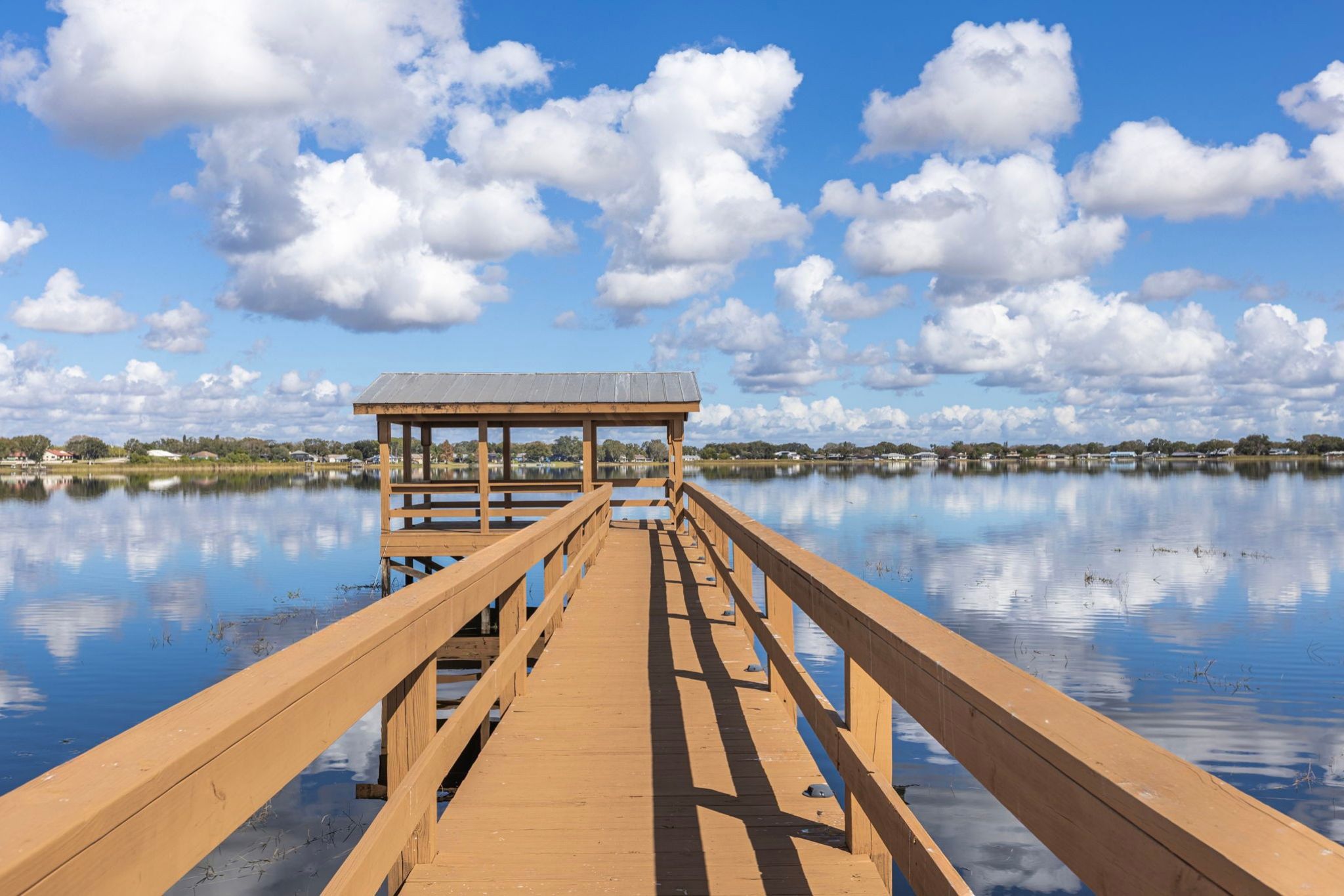 A wooden bridge over water.