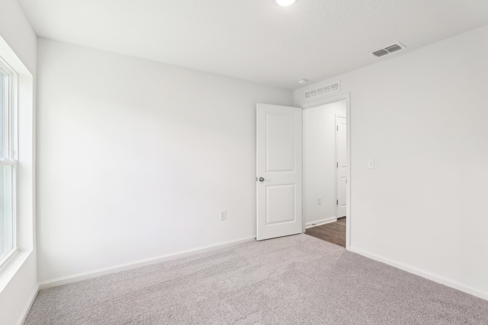 A room with white doors.