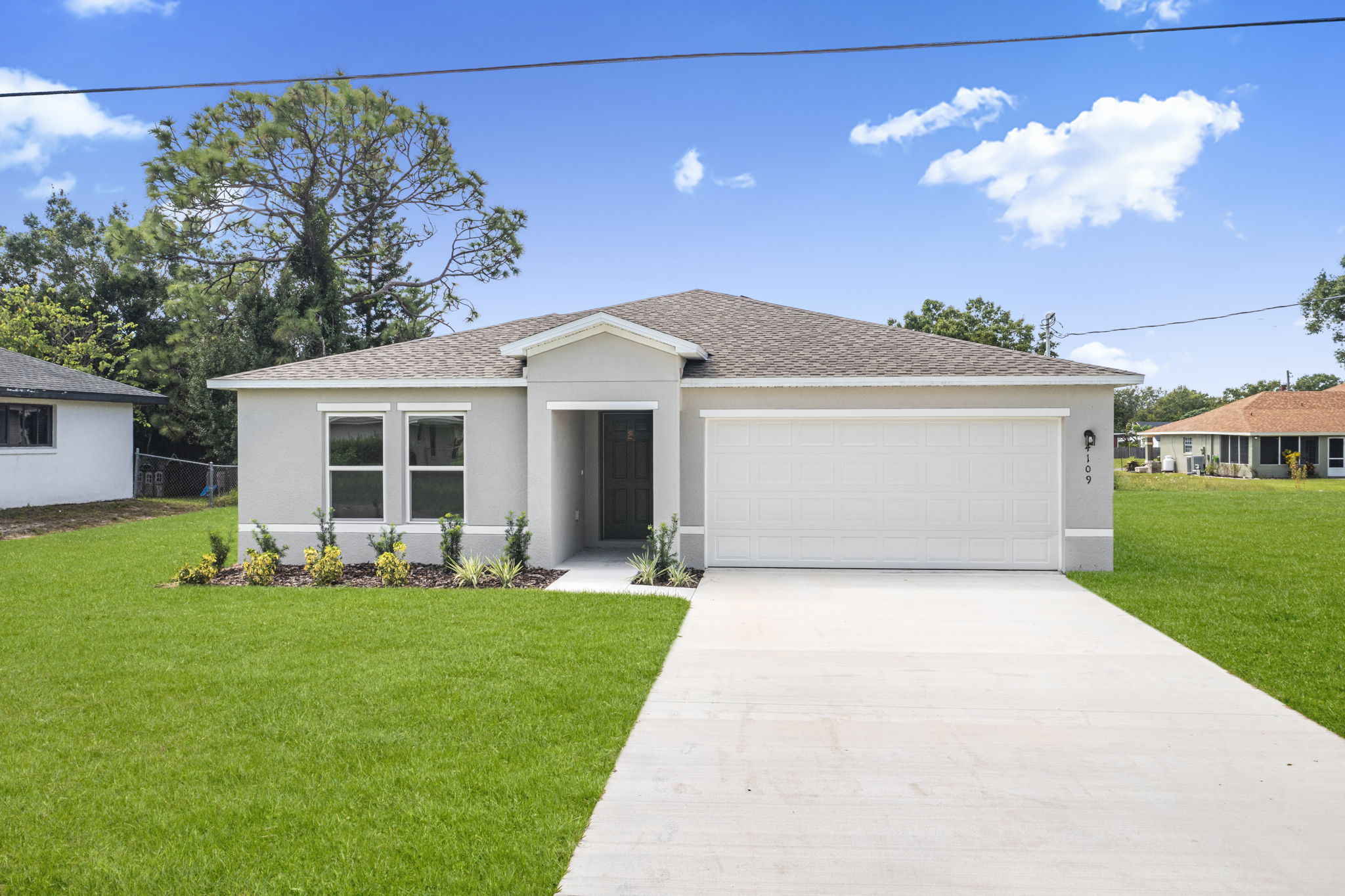 A house with a driveway.