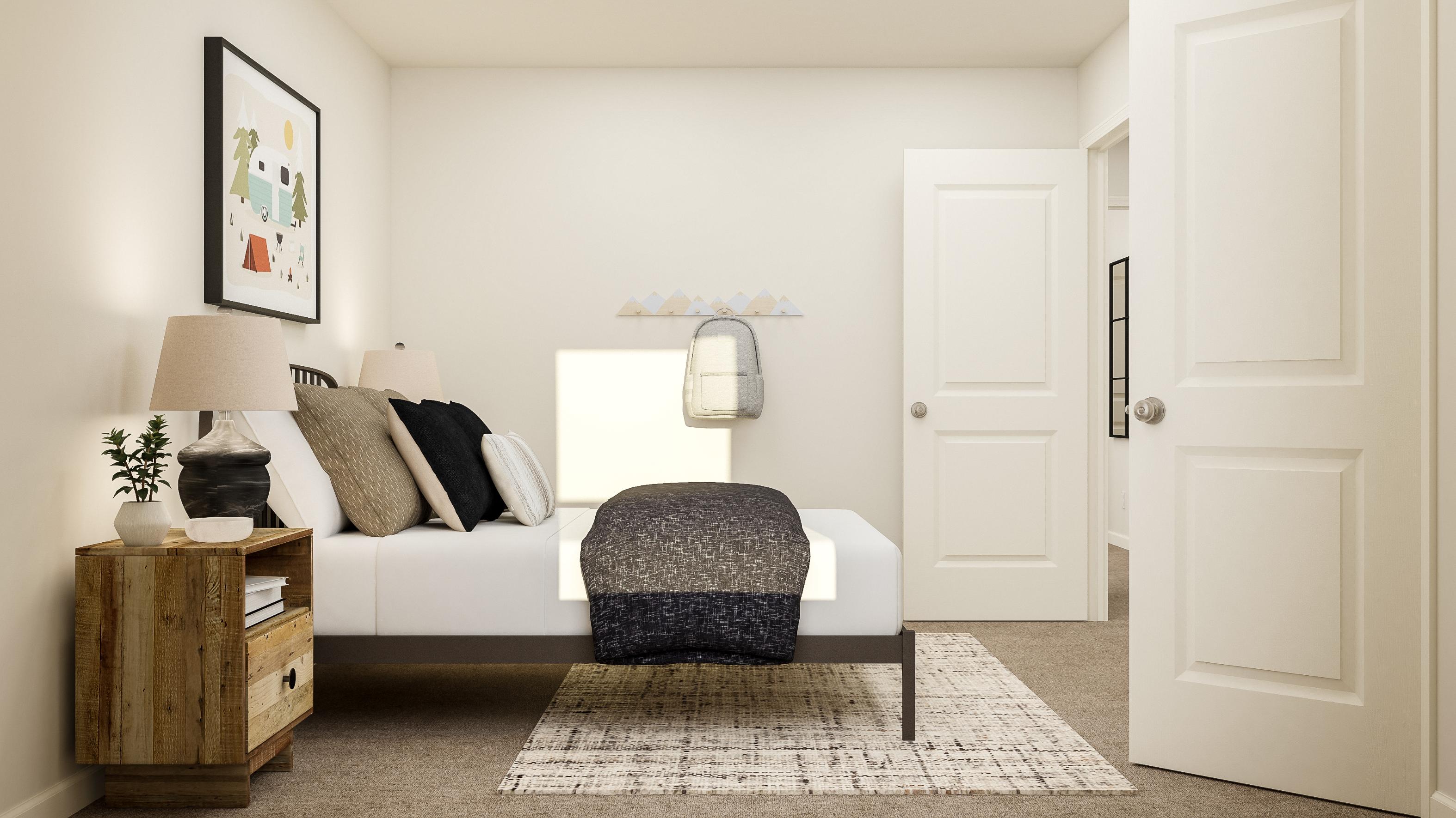 A room with a couch and a chair.